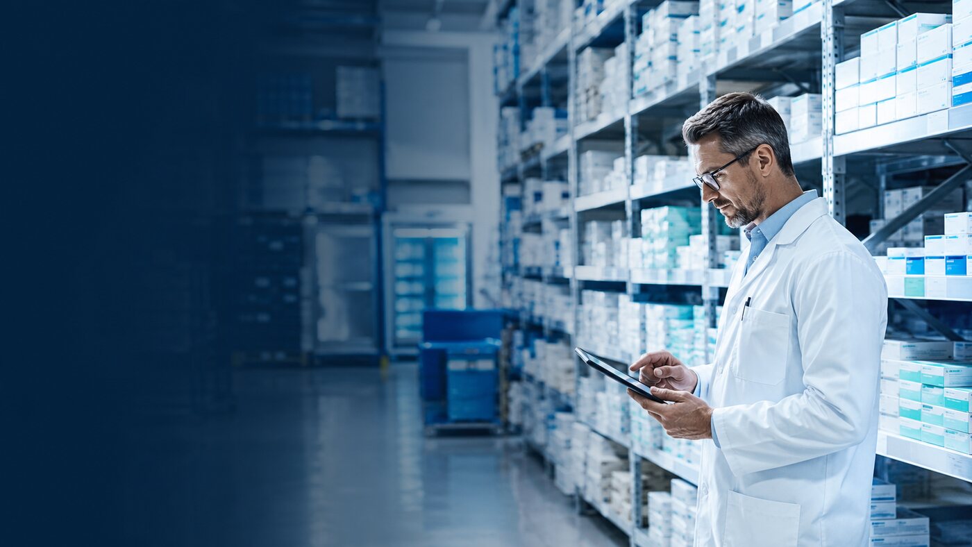 Pharmaceutical professional managing warehouse inventory